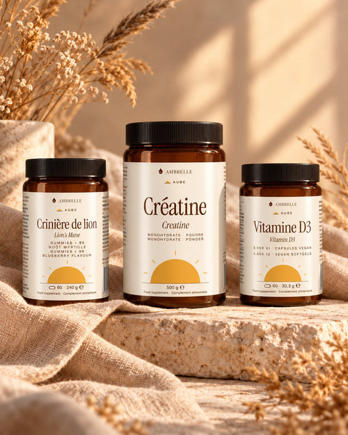 Aube Box by AMBRELLE: 3 jars side by side in warm amber light